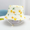 Detail of children's cotton sun hat featuring yellow crown prints and adjustable chin strap - Size 50/1-3 Years / White-Leaf Crown