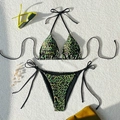 Flat lay of green leopard print bikini set with neck ties and decorative sunglasses - Green Leopard