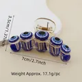 Blue Evil Eye hair claw clip made of acrylic with a gold spring mechanism, 7cm width - 7cm 5-Round Eye Claw Clip