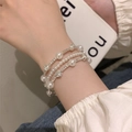 Dreilagiges Perlenarmband mit Strasssteinen und Schleife im eleganten Silber-Design - S529 Silber