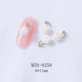 Detailed view of white resin camellia and gold note nail art charms sized 6x11mm - Pearl White 3D Rose Style (8259Pearl White)