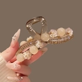 Elegante pinza per capelli ambra con rose crema, perle e strass dorati - Camelia Incrociato