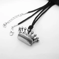 Detailed shot of silver crown pendant on black woven cord with adjustable lobster clasp - Style A Silver / 60cm Black Cord