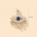 Macro view of silver evil eye pendant with blue zircon stones and 2.5cm size dimensions - B-4 Style/Pavé Blue Black Eye