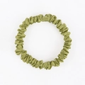 Single emerald green 19mm mulberry silk scrunchie with soft glossy texture and folds - 1cm/19 Momme / Fruit Green