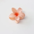 Detail of peach orange plumeria hair claw clip with glossy resin finish and 8cm size - Glossy Peach Orange Gradient