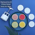 Dettaglio dello stampo per mooncake rotondo da 100g con 4 timbri floreali e pressa manuale - Set Rotondo 8 (4 Motivi)
