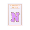 Macro view of purple chenille letter N patch with gold sequins and adhesive backing - Letter N / Purple