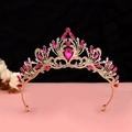 Detail showing the intricate gold frame and pink teardrop crystals on the baroque tiara - No.2 KC Gold (White + Rose Red)