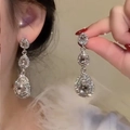Elegant silver teardrop earrings with sparkling faceted stones on a model - 12# Silver Earring Post - Silver
