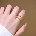 Double-layered gold stacking rings featuring one plain band and one pavé cubic zirconia ring - Double Layer Open Style (6972) / Gold