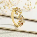 Macro detail of adjustable maple leaf ring featuring pear-cut zircon floral crystals - Flower Style (RG0700-A)