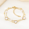 Dubbellaagse gouden roestvrijstalen armband met witte hartbedeltjes en parels - Hart Armband Stijl (KB204091-SXSJ)