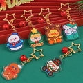 Christmas acrylic keychain featuring snowman and deer with gold star and red bell - DC Christmas Acrylic Keychain 1pc