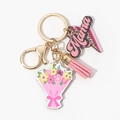 Close-up of pink flower bouquet pendant and Mama leopard print tag on golden keychain - Pink Leopard MAMA Style