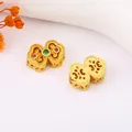 Detail of hollow gold-plated beads featuring colorful crystals and intricate cloud patterns - 22# Sand Gold Bowknot