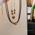 Retro brown bead and synthetic stone pendant necklace with silver link chain and cord details - X1635 Brown - Retro Layered