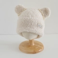 Detail of beige plush earflap hat with cute bear ears and delicate lace trim for girls - 52-54cm (3-8 Years) / Beige