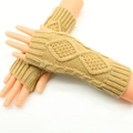 Close-up of beige cable knit fingerless gloves with classic braided texture pattern - One Size / Light Khaki