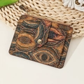 Slim cork wallet with multi-card slots and retro evil eye patterns on a woven mat - Evil Eye Style