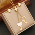 Gouden roestvrijstalen sieradenset met hart sleutel hanger ketting en ster oorbellen - Hartsleutel (5#)