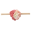 Close-up of pink and beige nylon floral headbands with soft elastic texture for infants - Gradient Colors