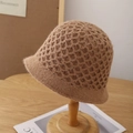 Detailed view of brown handmade crochet bucket hat with hollow honeycomb knit texture - Adjustable / Caramel color