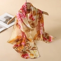 Elegant floral print chiffon scarf in beige with pink peonies hanging on a hanger - Retro Beige Peony