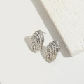 French vintage style silver spiral love stud earrings with textured metallic finish - Oval / Silver
