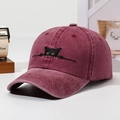 Adjustable washed cotton baseball cap in wine red with a black cat embroidery detail - Burgundy