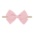 Pink fabric bow headband with beige elastic nylon band and soft linen texture - Linen Pink