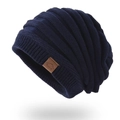 Classic dark blue knitted beanie with a leather Sport patch and warm ribbed texture - Navy Blue