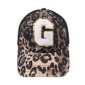 Detailed close-up of leopard print trucker hat with gold-edged sequined letter G patch - Letter G (Black Leopard)