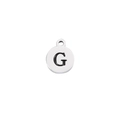 Macro shot of silver stainless steel round pendant with engraved black letter G - Steel Letter G