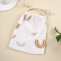 Detail of soft muslin cotton drawstring bag with rainbow prints for baby accessories - White Rainbow