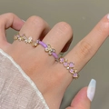 Three-piece ring set with butterfly and flower designs in purple enamel and zircon - Purple Butterfly Flower Set of 3 (0789) / Three-Piece Set / KC Gold