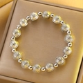 Ethnic vintage silver beaded bracelet with engraved wheel patterns and matte metal finish - Silver Retro Engraved Bracelet (X754)