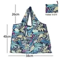 Foldable navy blue eco-friendly shopping bag with tropical leaf pattern, size 58x40cm - Tropical Leaves