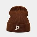 Detail view of brown knit beanie featuring a white P letter embroidery and thick texture - Coffee
