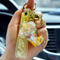Creative yellow liquid unicorn milk tea cup keychain with golden bell and silicone strap - Bright Yellow