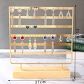 Detail view of gold multi-layer metal earring display stand with wood base and dimensions - 6 Layers / Gold