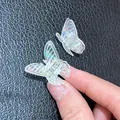 Mini iridescent butterfly hair claws in translucent acrylic with aurora shimmer finish - Flower Fairy