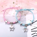 Rosa und blaue geflochtene Pärchen-Armbänder mit Herzschloss- und Schlüsselanhängern im Set - Liebesschloss und Stern (2er-Set - Buntes Seil)