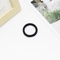 Detail of high-elastic black seamless hair ties on white background with minimalist decor - 4cm Black (0.8g)