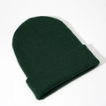 Close-up of a dark green ribbed knit beanie with a cuffed brim on white background - Dark Green