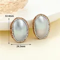 Vintage-style oval stud earrings with pearl finish and amber crystal border - K-0840 Mabe Pearl Oval Stud Earrings (Large)