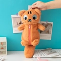 Detailed view of plush orange cat pencil case with pink zipper and top handle - Little Tiger