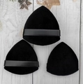 Three black triangular flocked powder puffs on a white wooden background with decorations - Black Pineapple Puff-3pcs