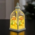 Close-up of a white Christmas lantern with reindeer motifs and glowing warm LED light - Elk