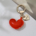 Red leather heart keychain with golden metal ring and engraved Love pendant charm - Orange